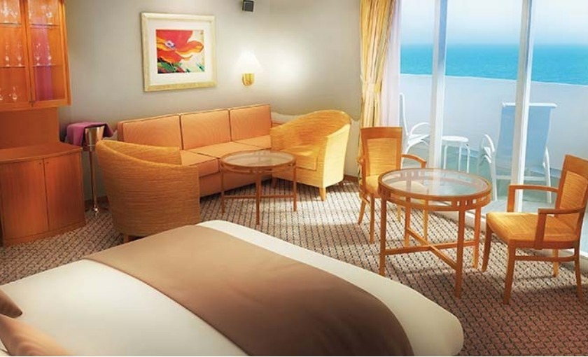 Een suite met balkon op de norwegian Sun